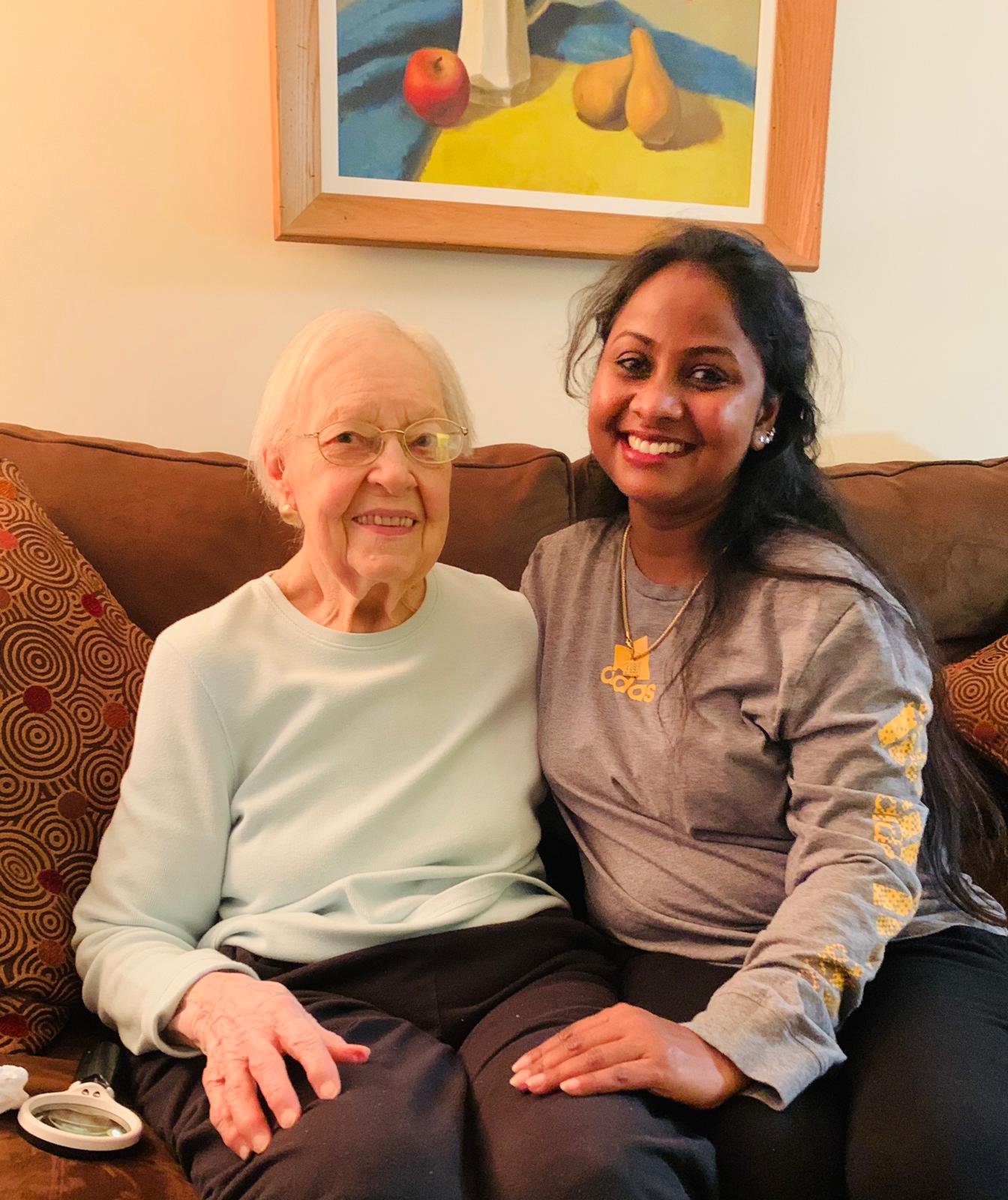 A.M.P HomeCare Solutions caregiver with client